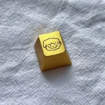 Artistic golden sheep artisan keycap, handcrafted from aluminum alloy, featuring a whimsical metallic design and premium finish.