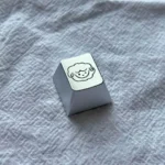 Whimsical silver sheep artisan keycap, handcrafted from aluminum alloy, showcasing intricate details and a premium metallic finish for ESC keys.