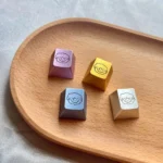 Handcrafted whimsical cute sheep keycap for ESC, made from premium aluminum alloy with vibrant metallic finish and intricate artisan details.