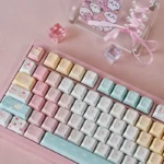 Explore the Sweet Treats Dessert Keycap Set from multiple delightful angles, highlighting the PBT Cherry profile and charming creamy pastel dye-sub dessert setup.