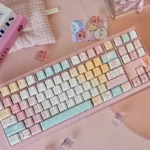 Sweet Treats Dessert Keycap Set: Playful PBT dye-sub keycaps with delicious pastel and creamy dessert motifs for a delightful keyboard aesthetic.