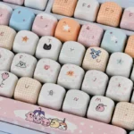 Close-up of vibrant Digimon MOA dye-sub keycaps set, showcasing beloved characters from a unique angle, highlighting their cute, detailed anime art.