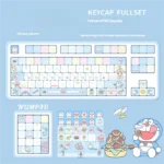 Close-up of vibrant blue and white Doraemon PBT dye-sub keycaps set, showcasing beloved characters and iconic gadgets from various angles, a nostalgic set.