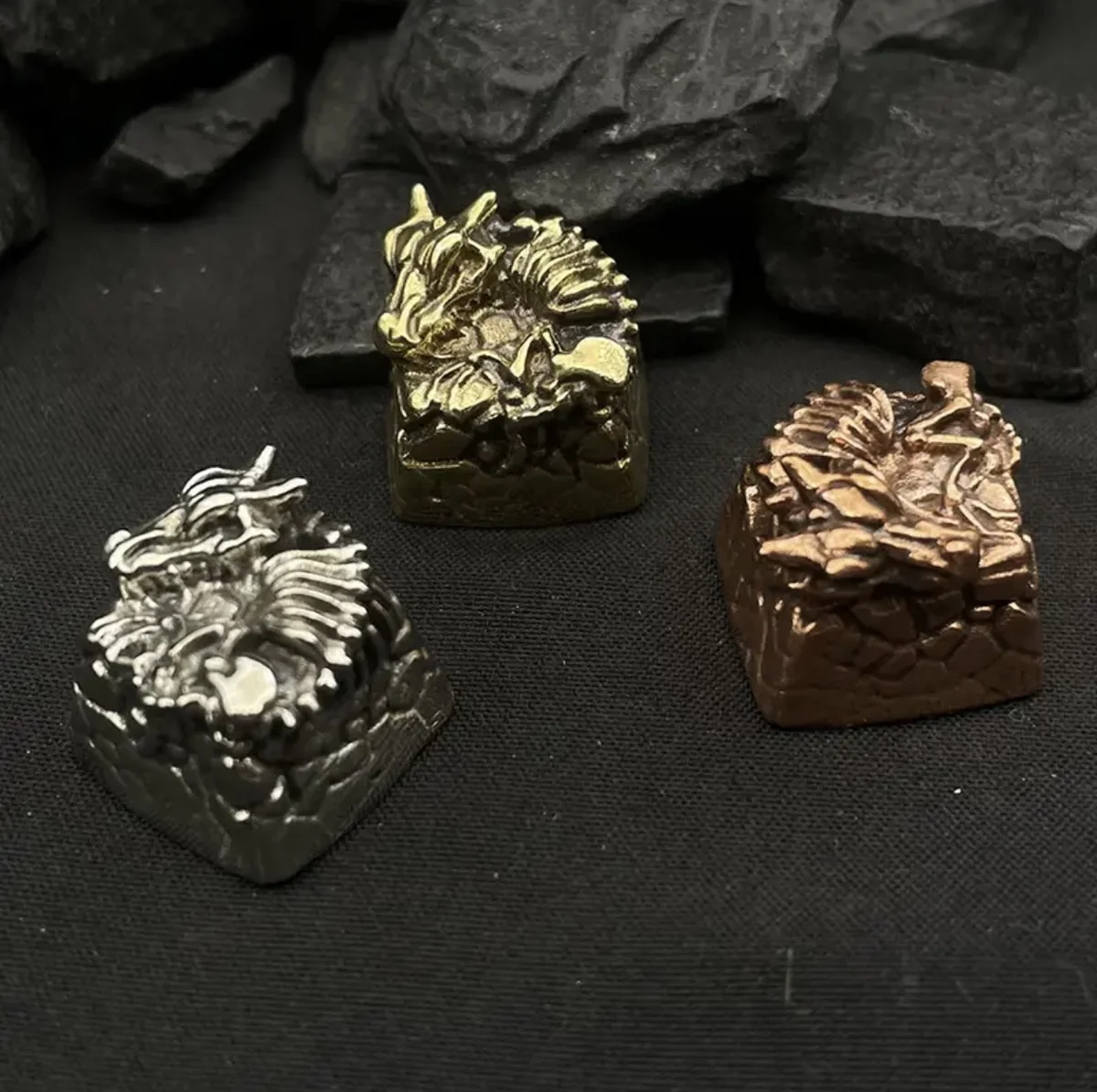 Close-up views of the handcrafted pure copper Dragon Keycap, showcasing its intricate Chinese zodiac dragon sculpture from multiple artistic angles.