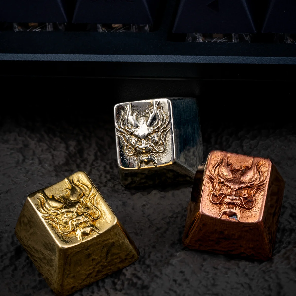 Multiple views of the handcrafted dragon artisan keycap, showcasing its mythical design and lustrous metallic finish from various artistic angle.