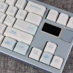 Dream Butterfly PBT dye-sub keycaps set. Ethereal blue-white butterfly motifs from various angles, highlighting durable mechanical PBT.