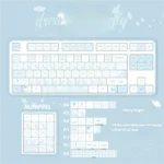 Close-up of Dream Butterfly PBT dye-sub keycaps set, showcasing the serene blue and white butterfly motifs on a mechanical keyboard.