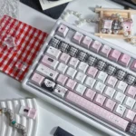 Dreamscape PBT Keycaps set, displaying ethereal pastel gradients and the comfortable Cherry profile from various angles. Highlights durable PBT craftsmanship.