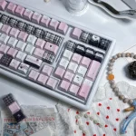 Dreamscape PBT Keycaps Set gallery showcasing the ethereal Cherry profile set from various artistic angles, highlighting serene pastel gradients and durable material.