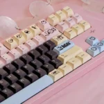 DuCato Cherry Keycap Set, showcasing vibrant character art and unique five-sided dye-sub legends from various angles. A playful setup.