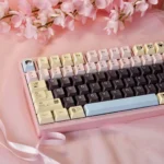 DuCato Cherry Keycap Set with unique five-sided dye-sub legends, showcasing vibrant character art for a playful keyboard.