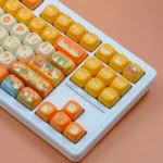 A close-up view of the whimsical duck flower MOA PBT keycaps set, showcasing charming cartoon ducks nestled among vibrant, pastel-colored blooming flower.