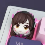 Explore the vibrant, handcrafted D.VA Overwatch artisan keycap from various angles, showcasing its detailed pink resin artistry and unique gaming aesthetics.