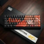 Vibrant EVA Asuka PBT keycaps with striking red and orange hues, featuring artistic side-lit legends for an iconic anime aesthetic.