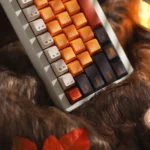 Elegant CNC aluminum fox keycap, artisan crafted with intricate metallic details and a vibrant anodized finish, displayed from various captivating setup.