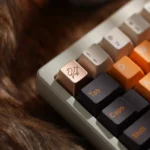 Elegant CNC aluminum fox keycap from various angles, revealing its intricate design, vibrant anodized finish, and artisan ESC detail.