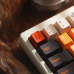 Gallery of elegant CNC aluminum fox keycaps, showcasing intricate artisan designs from multiple angles with vibrant anodized finishes, perfect for collectors.