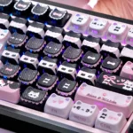 Elegant Lace Cat MAO Keycap Set, showcasing intricate lace patterns and graceful feline silhouettes from various artistic angles.