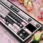 A detailed view of the Elegant Lace Cat MAO Keycap Set, highlighting the intricate lace patterns and graceful feline silhouettes adorning each.