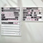 Elegant Lace Cat MAO Keycap Set, showcasing intricate feline silhouettes and sophisticated lace patterns from various artistic angles.