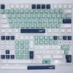 A durable PBT dye-sub emblem keycap set featuring classic heraldic symbols in an elegant cyan main color palette for mechanical keyboards.