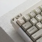 Precision CNC Moon ESC Keycap displayed from multiple perspectives, revealing its premium sleek metallic finish and intricate celestial lunar design.