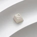 A detailed view of the precision CNC Moon ESC Keycap, highlighting its sleek metallic finish and minimalist celestial design, perfect for premium design.