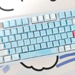 Vibrant Evangelion Unit-00 Keycaps Set featuring exclusive manga graffiti art on durable PBT, showcasing a bold anime aesthetic for custom keyboards.