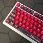 Artistic shot of Evangelion Unit-02 Keycaps Set, showcasing fierce mecha design. Bold red and black PBT keycaps with iconic Unit-02 detailing for your setup.