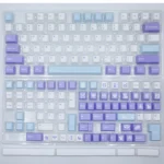 Enchanting Fairytale Keycap Set with whimsical PBT dye-sub designs. Features dreamy purple hues, enchanting storybook motifs, and magical inverse design.