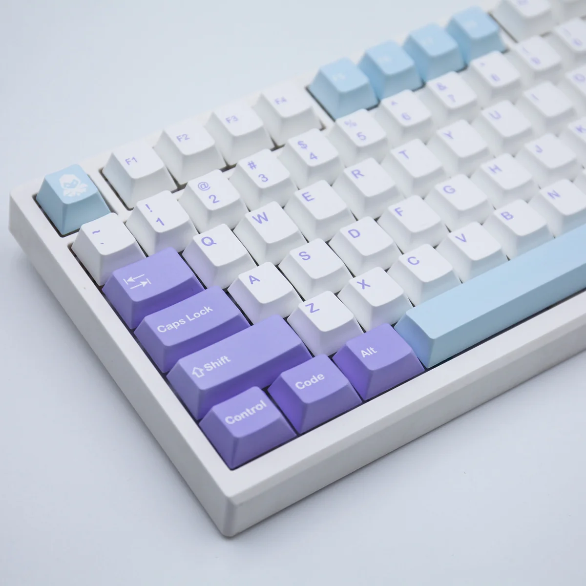 Whimsical PBT dye-sub Fairytale Keycap Set, showcasing dreamy purple hues, enchanting storybook motifs, and magical depth.