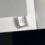 Detailed side view of the Festive Fireworks Keycap, highlighting its intricate CNC-machined fireworks design and premium metallic artistry.