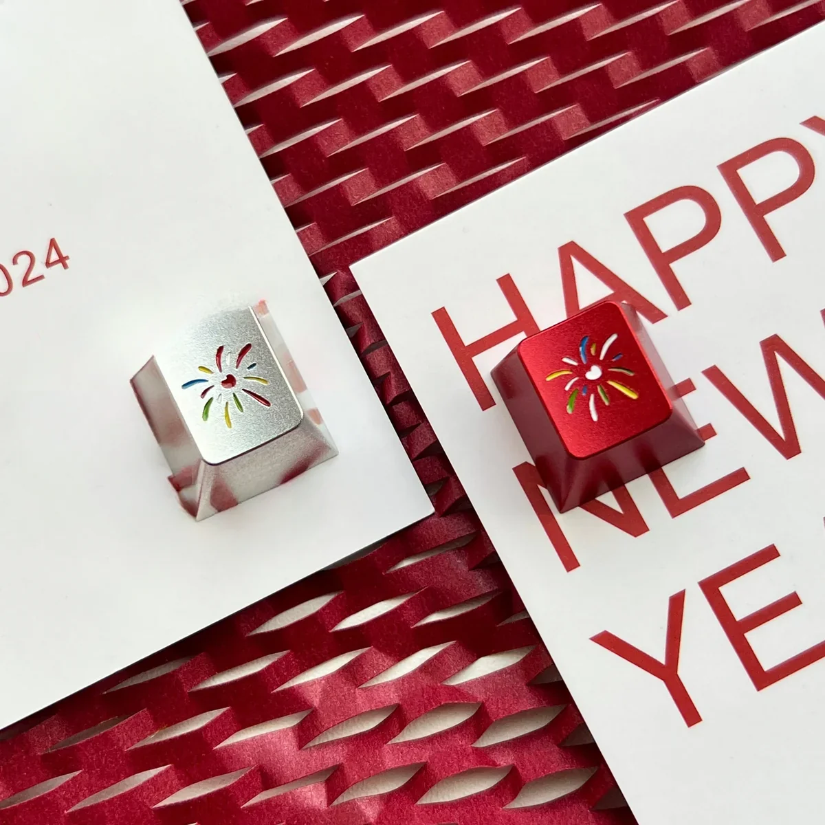 Close-up of a premium Fireworks Keycap, showcasing intricate CNC-machined art with a vibrant festive fireworks design.