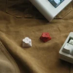 Floral Keycap in various views, highlighting its precision CNC aluminum structure and exquisitely etched floral design, embodying artisan.