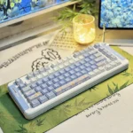 Multiple views of the durable PBT dye-sub Midsummer Daisy Cherry Keycap Set, showcasing the delicate chrysanthemum and serene summer aesthetic for a refreshing desktop.