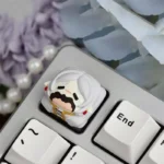 Vibrant, handcrafted Frieren artisan keycap for ESC, featuring a detailed anime character sculpture, perfect for a unique keyboard.