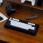 Multiple angles of the premium Cosmic Elegance Galaxy PBT MOA keycap set, showcasing its striking black and white celestial patterns and unique profile setup.