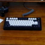 Close-up of Cosmic Elegance Galaxy PBT MOA Keycap Set showcasing premium PBT texture and a detailed black and white celestial pattern on its unique design.