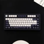 Premium Cosmic Elegance Galaxy PBT MOA Keycap Set main image. Features striking black and white celestial patterns and unique MOA profile.