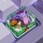 Close-up of a vibrant, handcrafted Gengar artisan keycap, showcasing its detailed resin texture and iconic mischievous expression from a side angle.