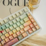 Ghibli Floral Wonderland PBT keycaps set, a detailed view showcasing the whimsical flower field designs and vibrant, serene colors for custom keyboard.