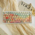 A vibrant, enchanting Ghibli Floral Wonderland PBT keycap set, featuring lush flower fields in serene, artistic colors. Perfect Ghibli Keyboard.