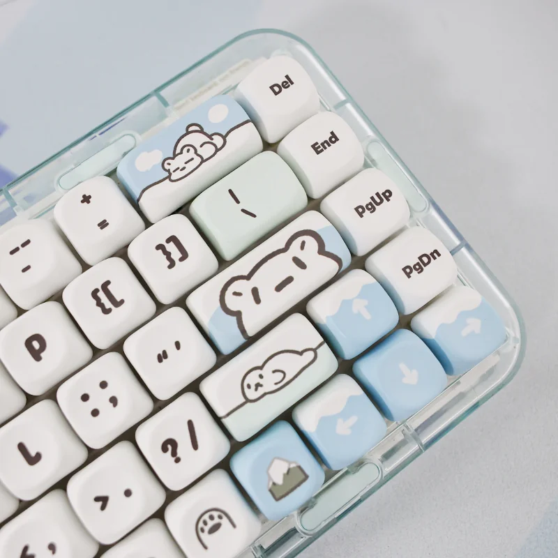 Glacier Bear PBT Dye-sub MOA Keycaps Set, an artistic close-up. Features adorable icy blue and white bear motifs and serene winter landscape. Unique premium design.