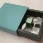 Green Artisan Keycap: Vibrant Spring Bud Green Aluminum keycap, intricate design, premium metallic finish from an angled view, highlighting Cherry R4 profile.