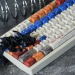 RX-78-2 Battle-Damaged Gundam keycaps set showcased from multiple angles, highlighting the intricate, weathered mecha aesthetic and unique artisan design.