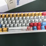 Close-up of vibrant Gundam Manga Art PBT keycaps set, showcasing iconic Mobile Suit characters in dynamic, classic art style and the durable PBT texture.