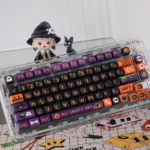 Vibrant Halloween Keycaps PBT dye-sub set for mechanical keyboards. Playful spooky pumpkins, ghosts, and bats pop on a dark background.