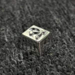 Detailed view of the premium Hammer Sickle Keycap, showcasing its iconic design, pure copper craftsmanship, and lustrous gold-plated finish from multiple angles.