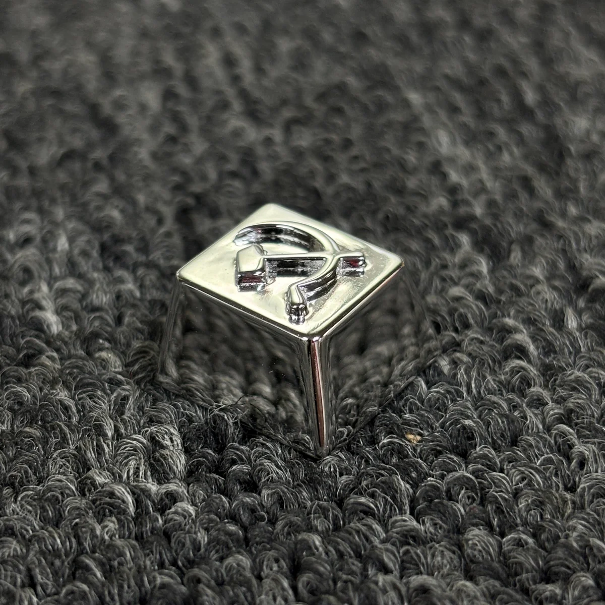 Detailed view of the premium Hammer Sickle Keycap, showcasing its iconic design, pure copper craftsmanship, and lustrous gold-plated finish from multiple angles.