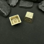 Bright, polished handcrafted hammered copper keycap, highlighting its unique retro texture and artistic craftsmanship for mechanical keyboards.